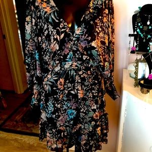 Lovestich Womens size small flirty floral dress with deep V back.